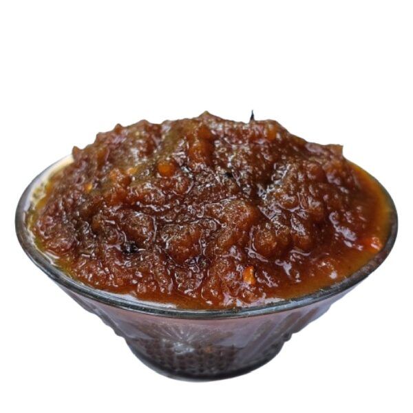 Moumachi Chalta Tok Jhal Mishti sauce served in a glass bowl close up